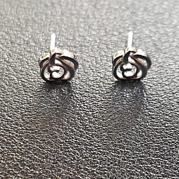 Silver rose adornments earrings studs